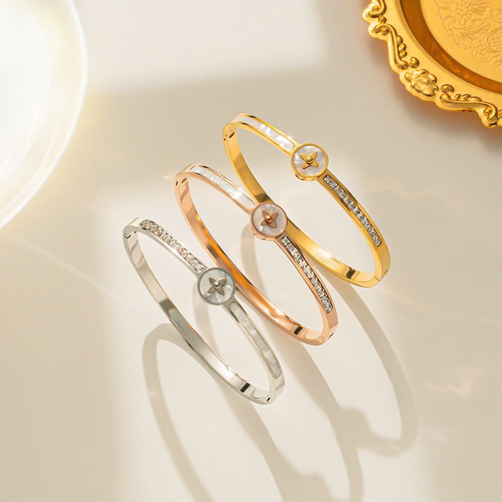 Minimalist Gold-Plated Titanium Steel Bracelet for Women with Rhinestone-Inlaid Shell and Letter Charm