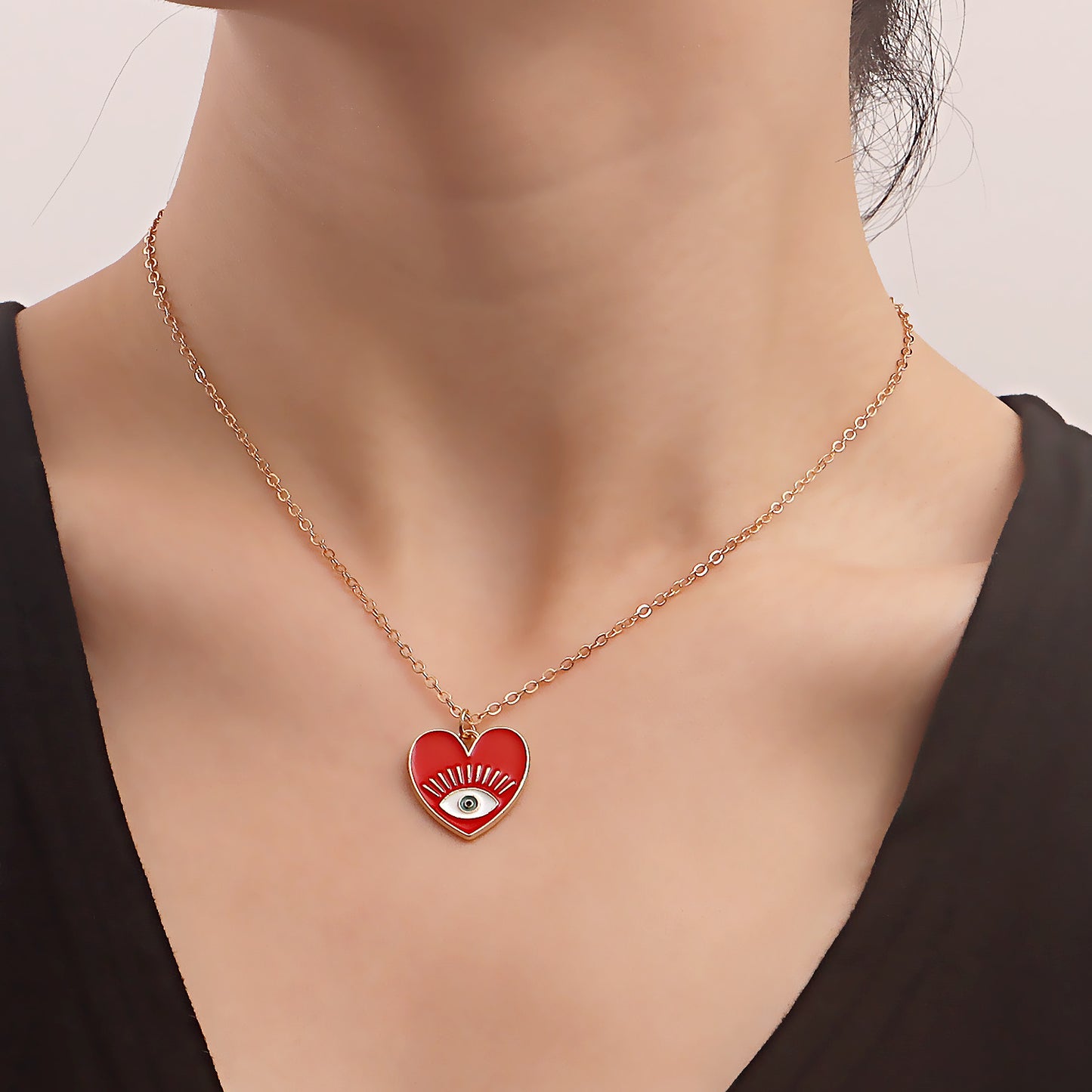 Minimalist Evil Eye Pendant Necklace for Women with Alloy Heart Charm and Geometric Design on Clavicle Chain