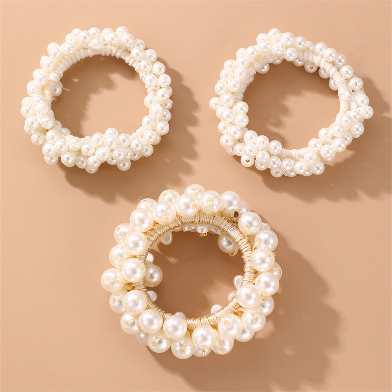 Juego de gomas de pelo florales minimalistas para niños con detalles de perlas y estructura de resina