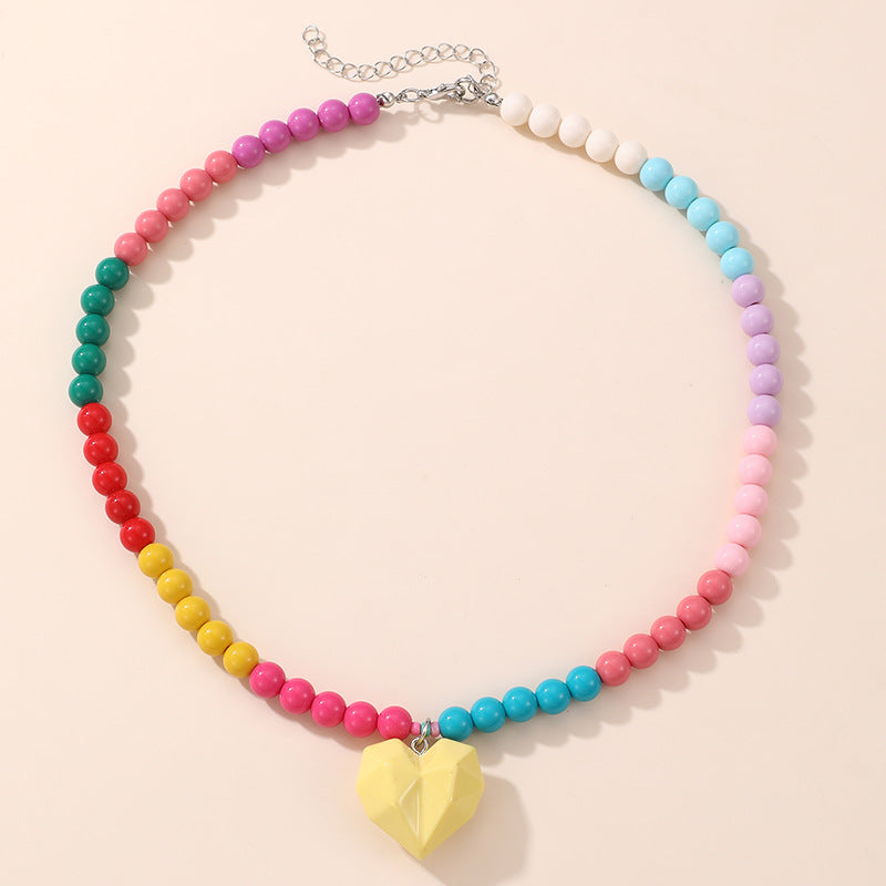 Lindo Collar de Resina con Forma de Lazo para Niñas con Acabado Pintado en Diseño Multicolor, Joyería Infantil Dulce y Juguetona