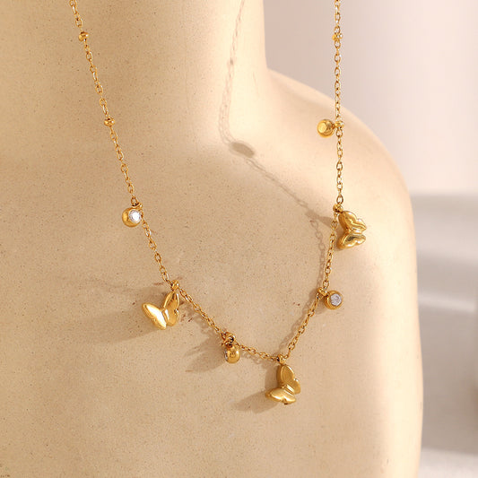 Collar con colgante de mariposa minimalista de acero inoxidable con baño de oro de 18 quilates e incrustaciones de circonita para mujer