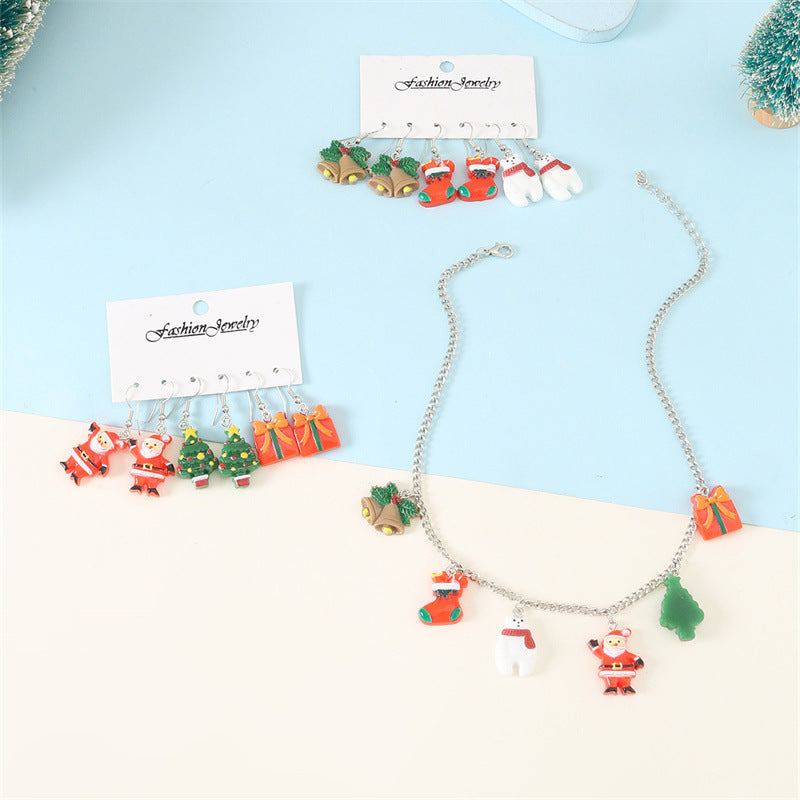 Set di collana e orecchini a tema natalizio con ciondolo di Babbo Natale in metallo e design a cappello di Babbo Natale per bambini