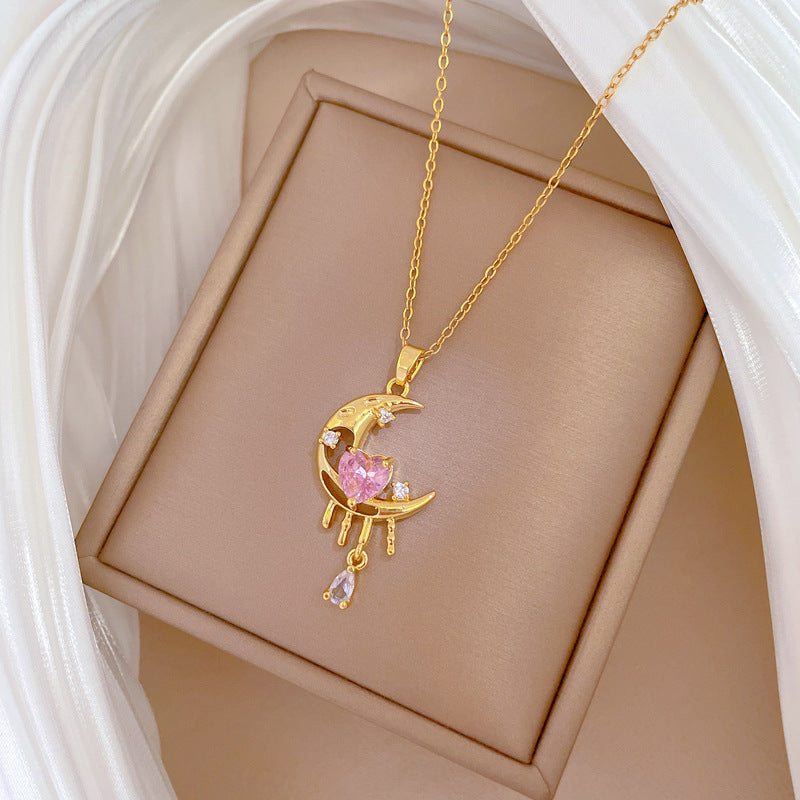Collana pendente minimalista a forma di luna con intarsio completo di strass su catena in acciaio al titanio per donna