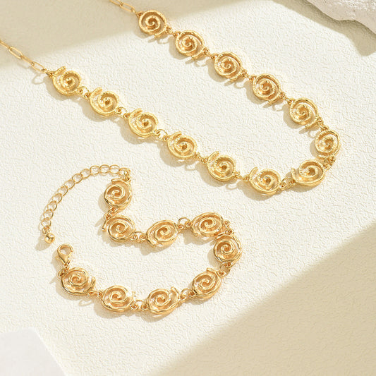 Juego de collar y pulsera de aleación con baño de oro de 18 quilates con diseño de símbolos geométricos de lujo ligero para mujer