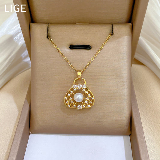 Collar con colgante de perlas huecas geométricas de lujo para mujer con cadena de acero de titanio e incrustaciones de diamantes de imitación