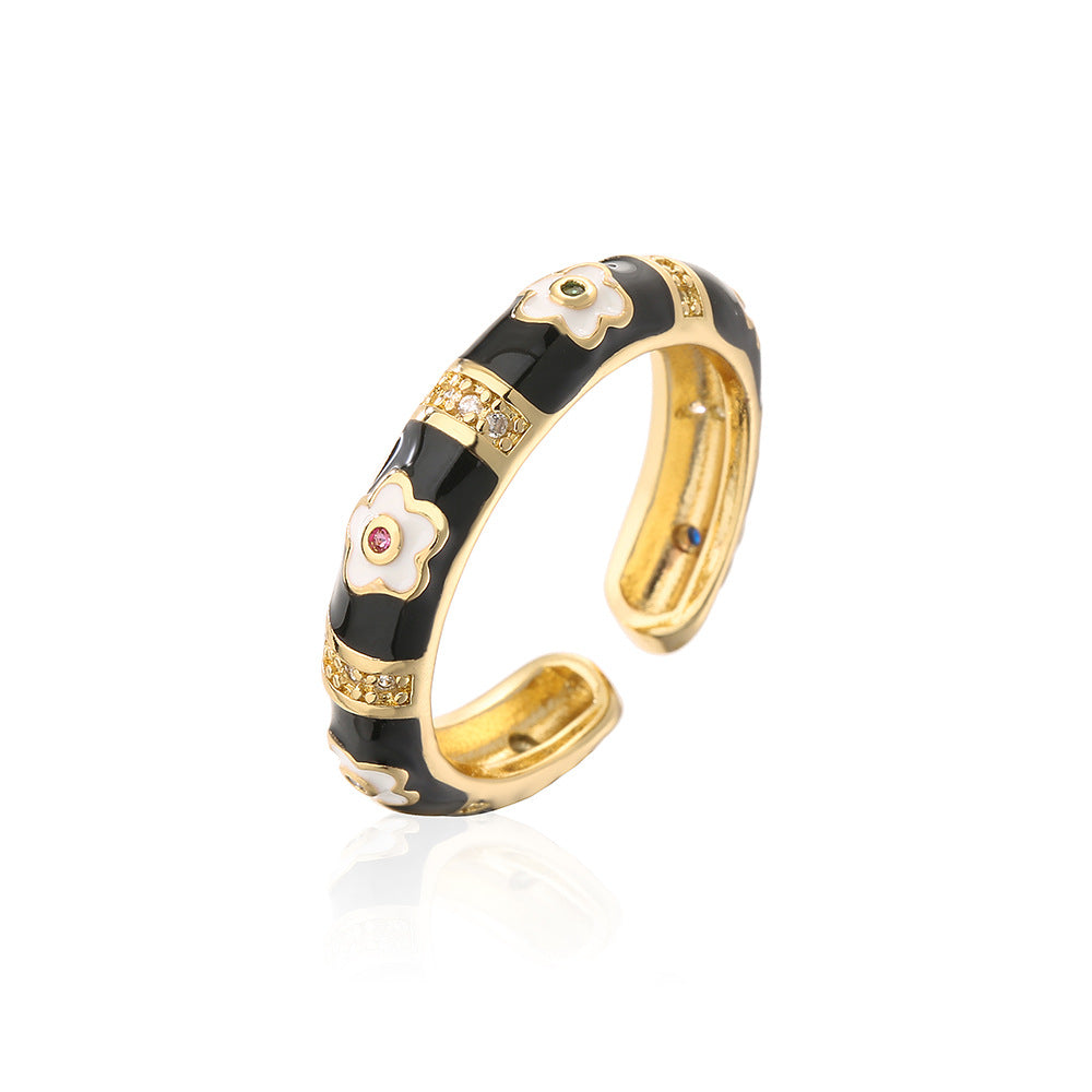 Anillo de flores geométricas irregulares estilo bohemio para mujer, hecho de cobre con chapado en oro de 18 quilates y acabado esmaltado