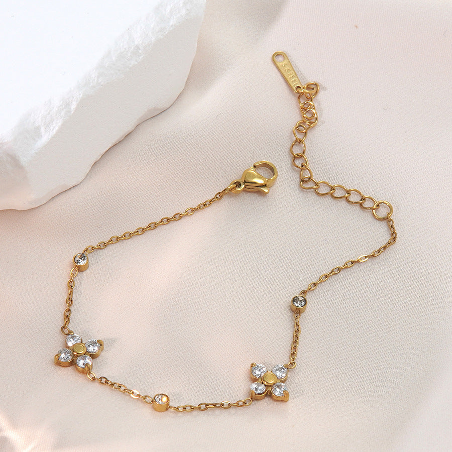 Elegante bracciale da donna in acciaio inossidabile placcato oro 18 carati, con strass e design floreale geometrico
