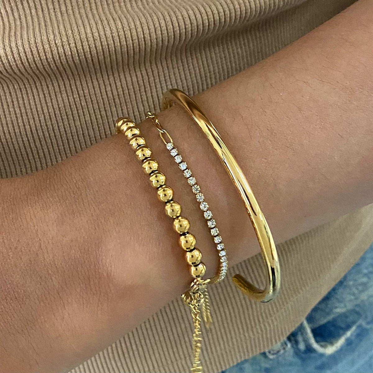 Bracciale da donna placcato in acciaio al titanio con forme geometriche