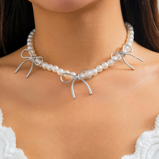 Collana girocollo minimalista da donna con fiocco e design geometrico in lega con catena di perline