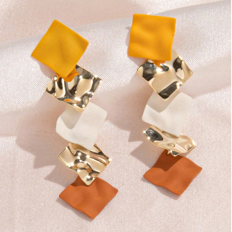 Pendientes largos colgantes minimalistas de cobre chapado con forma de onda geométrica y postes de acero inoxidable para mujer