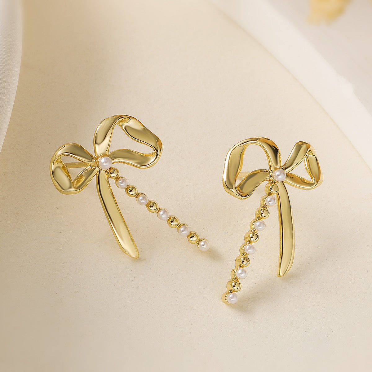 Sweet Bowknot Butterfly Earrings for Women with Copper Base Plated in Real Gold Micro-Paved Zirconia and Pearl Accents