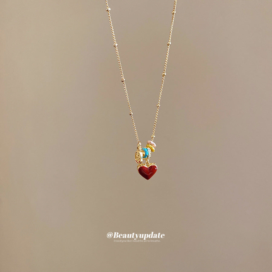 Collar para mujer de cobre chapado en oro de 18K con esmalte de corazón y nácar, estilo vintage