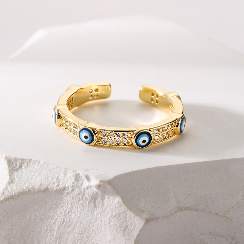 Anello Minimalista Geometrico Occhio di Allah da Donna in Rame Placcato Oro con Intarsio di Zirconi