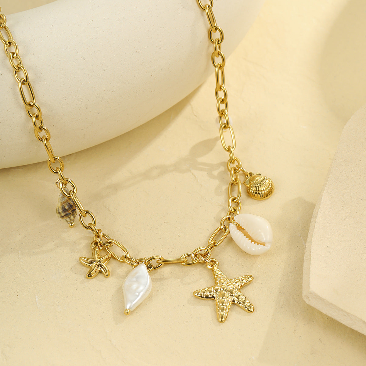 Set de collar con colgante minimalista de lujo con estrella de mar y concha con cadena de acero inoxidable para mujer