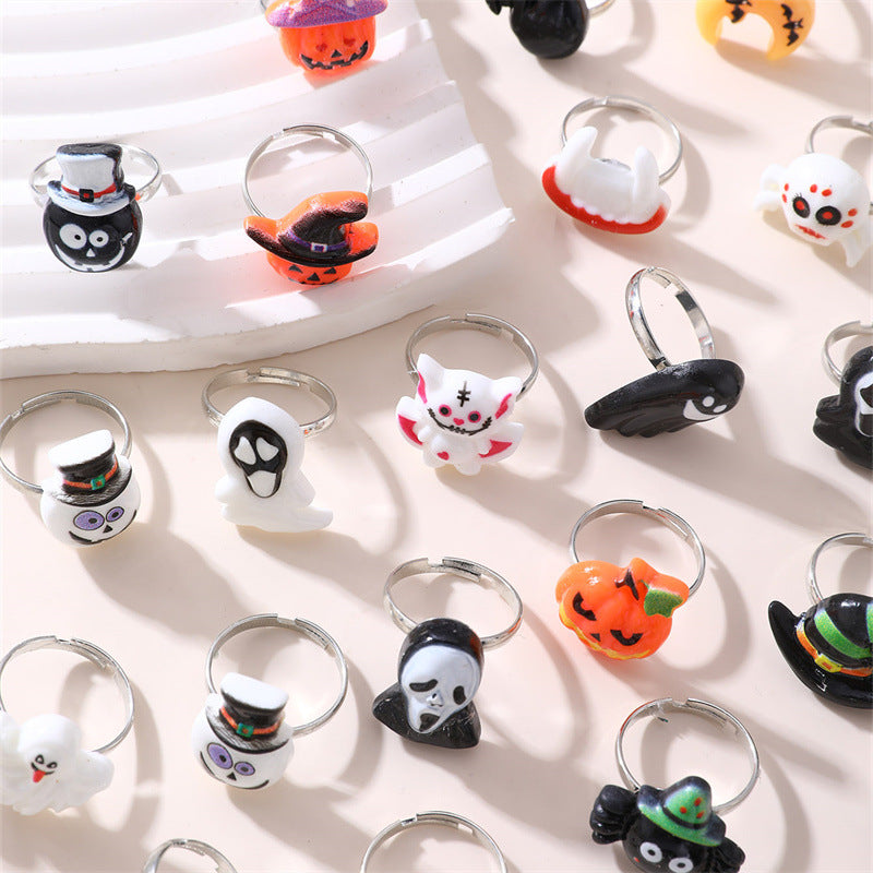 Juego de anillos infantiles con temática de Halloween, con diseños de calabaza, calavera y fantasma, anillos de plástico de resina para niñas de 6 a 10 años
