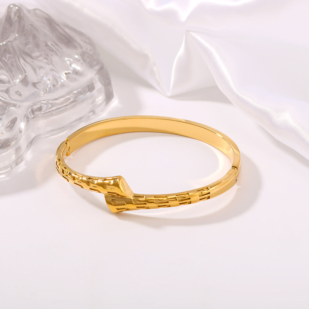 Asymmetrical Geometric Texture Stainless Steel Bracelet with 18K Gold Plating