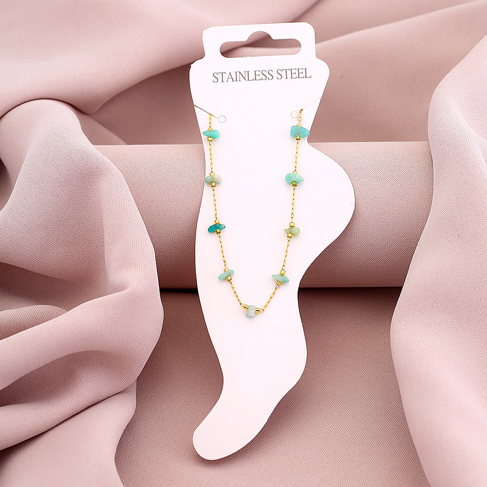 Elegante tobillera geométrica de acero de titanio para mujer con acento de piedra natural en azul pavo real