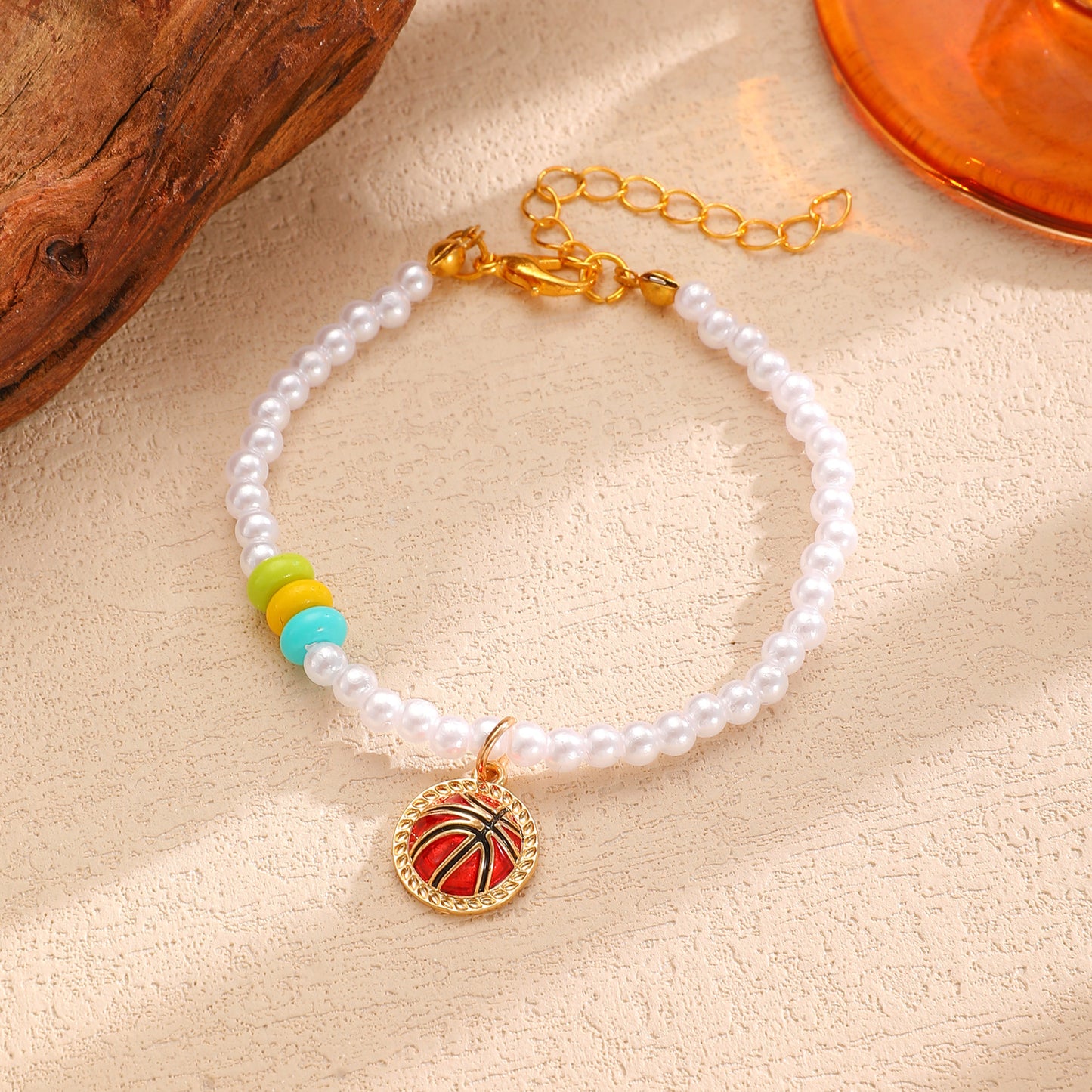Set di Collana, Bracciale e Orecchini con Pendente a Sfera in Lega di Zinco Placcata Sportiva e Perle per Donna