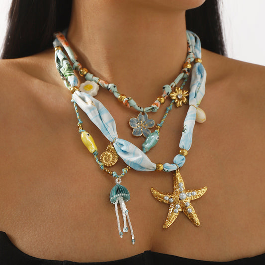 Collar con colgante de estrella de mar estilo INS para mujer con cadena de acero inoxidable bañada en oro de 14 quilates y detalles de esmalte con diseño geométrico