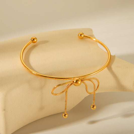 Fashionable 18K Gold Plated Stainless Steel Bow Knot Open Cuff Bracelet for Women