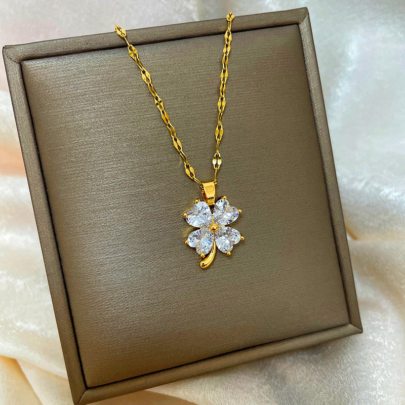 Collana con ciondolo a goccia in rame placcato oro 18 carati con micro-pavé e catena a onda in acciaio al titanio, design originale