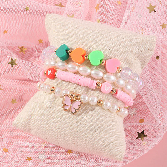 Set di gioielli per bambine carino e versatile, braccialetto fatto a mano con smalto a farfalla e cuore in argilla polimerica, con accenti di perle