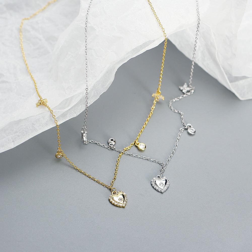 Sweet and Edgy Heart-Shaped S925 Sterling Silver Rhinestone-Inlaid French Clavicle Necklace with Cross Chain for Women