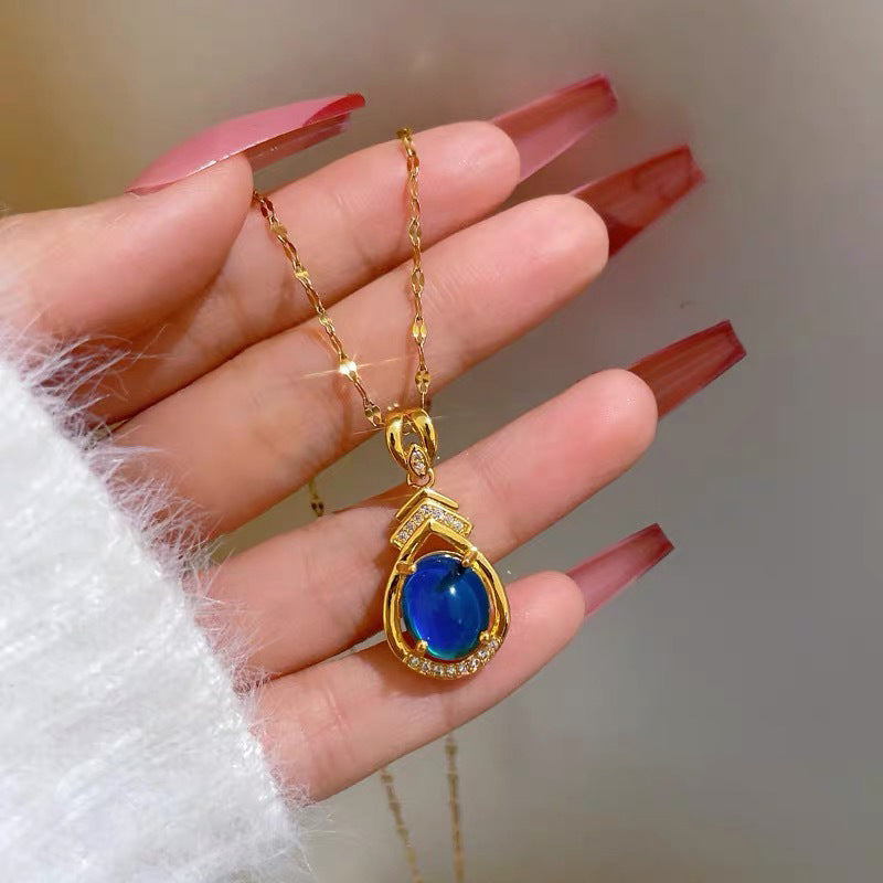 Collar termocrómico de gota de agua para mujer en acero de titanio con colgante chapado en oro, diseño floral y forma irregular en cadena tipo O