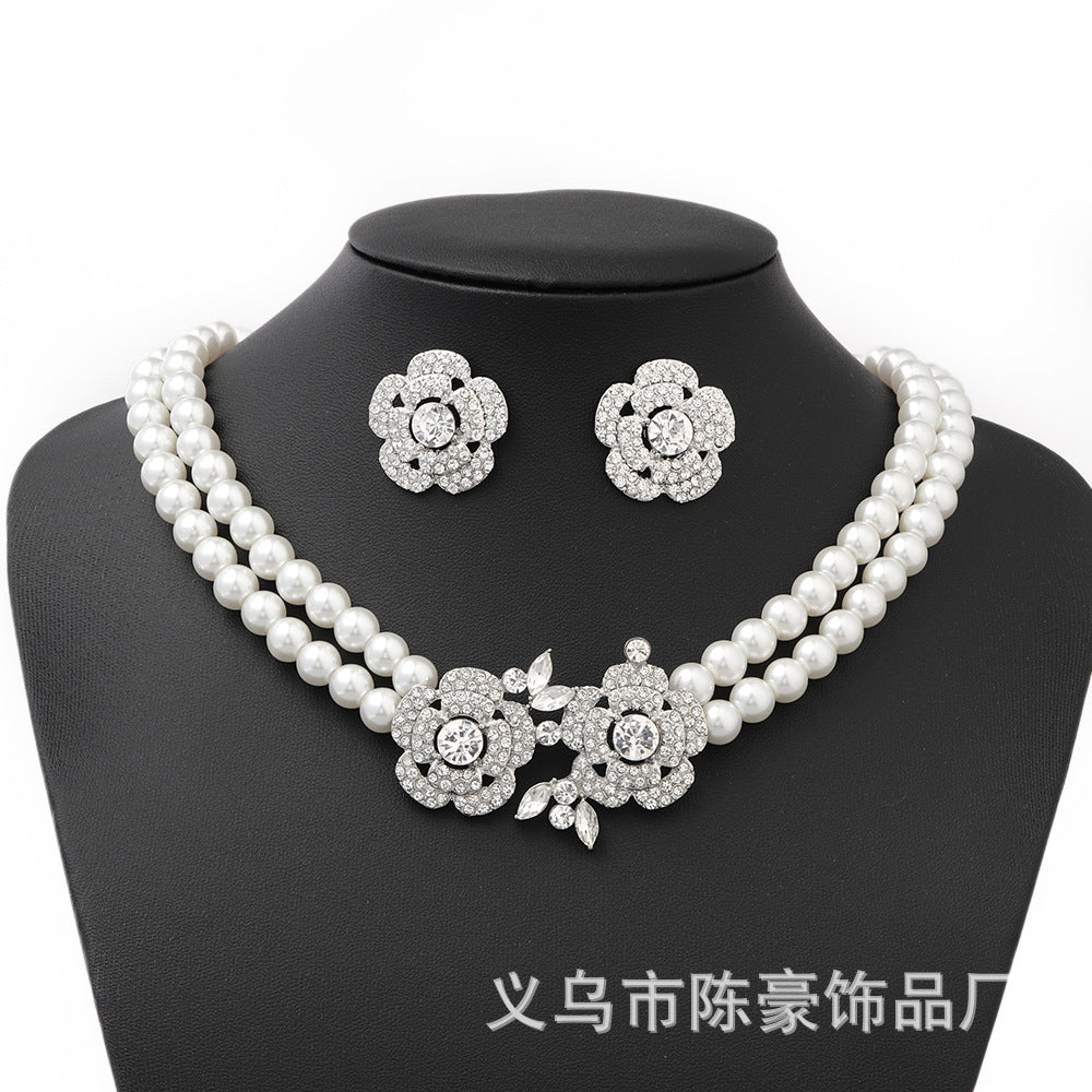 Juego de collar de perlas florales con pendientes y pulsera a juego para mujer, bisutería de estilo Art Déco con colgante de aleación y acabado chapado