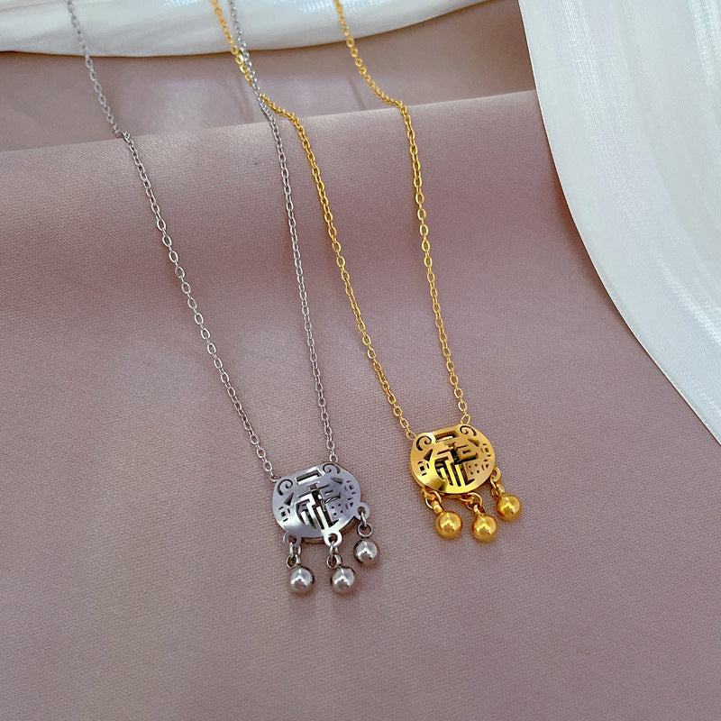 Collar con colgante minimalista geométrico de carácter Fu para mujer y hombre en acero de titanio con baño de oro en cadena tipo O