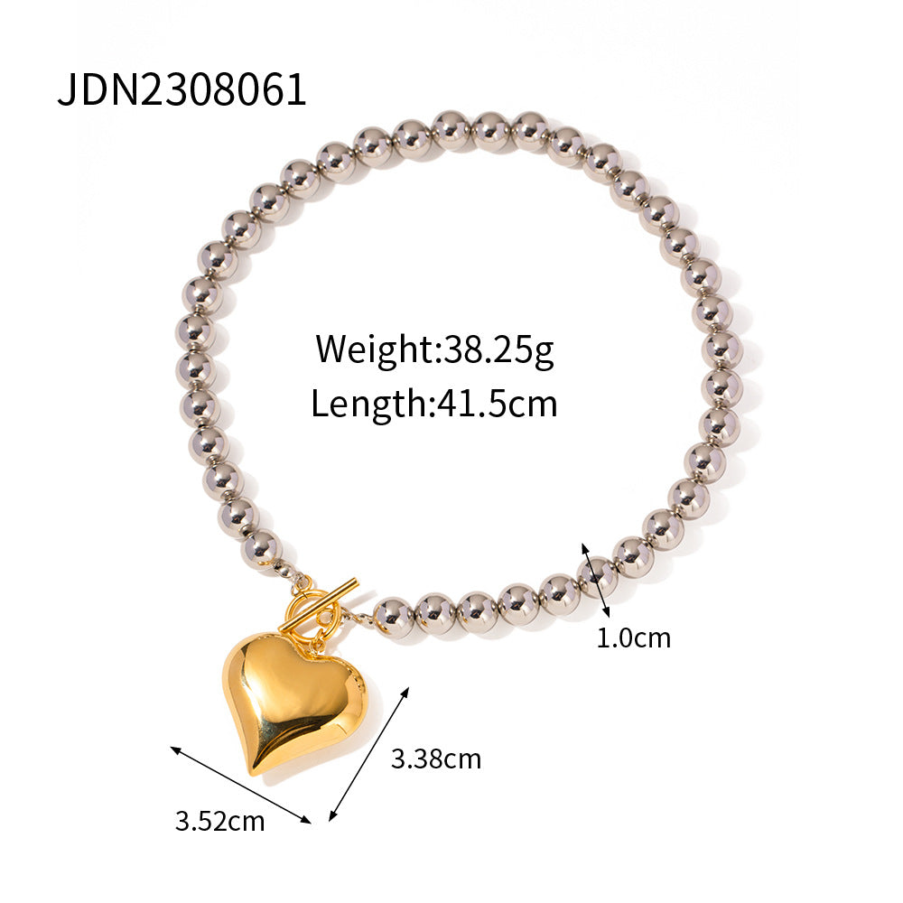 Collana minimalista da donna in acciaio inossidabile a forma di cuore con ciondolo in acciaio al titanio placcato