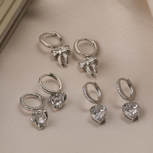 Orecchini da donna minimalisti in rame a forma di fiocco e cuore, placcati in oro vero con intarsio di zirconi