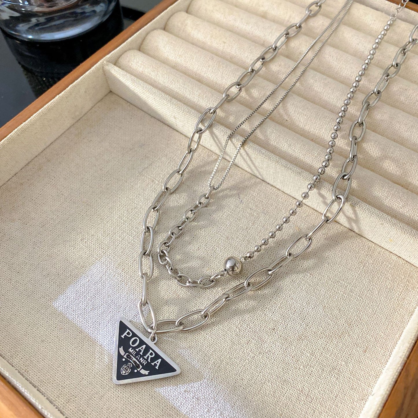 Geometric Gold Plated Titanium Steel Double Layer Necklace with Inverted Triangle Letter and Round Ball Pendant