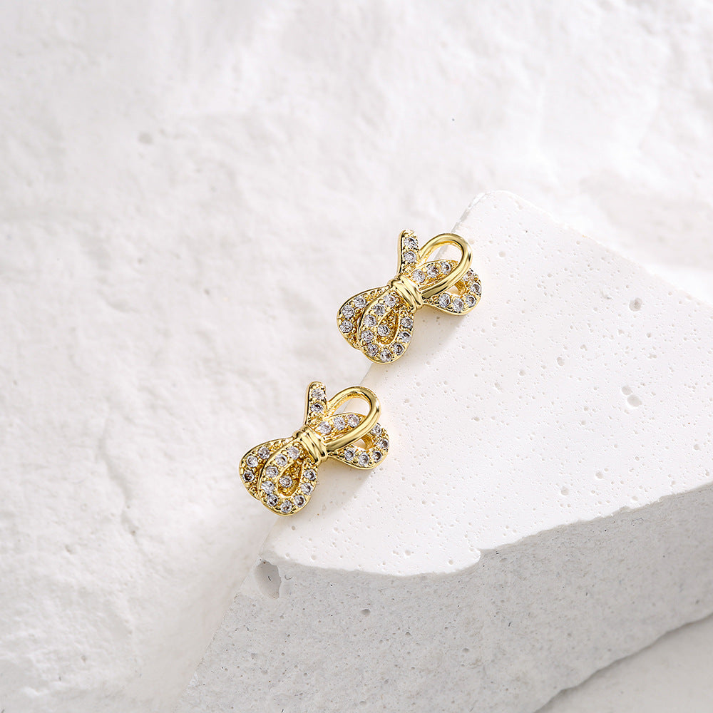 Minimalist Bowknot-Shaped Copper Earrings with 18K Gold Plating and Micro-Pavé Zirconia Eye Detail
