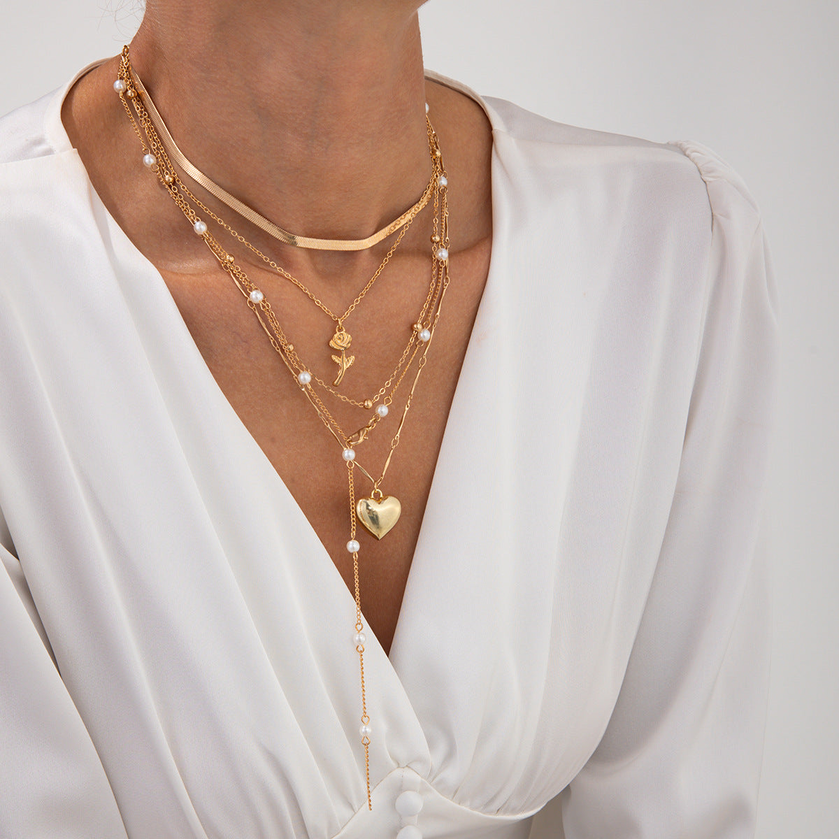 Collar minimalista de capas en forma de corazón con colgante de perlas en cadena de serpiente para mujer