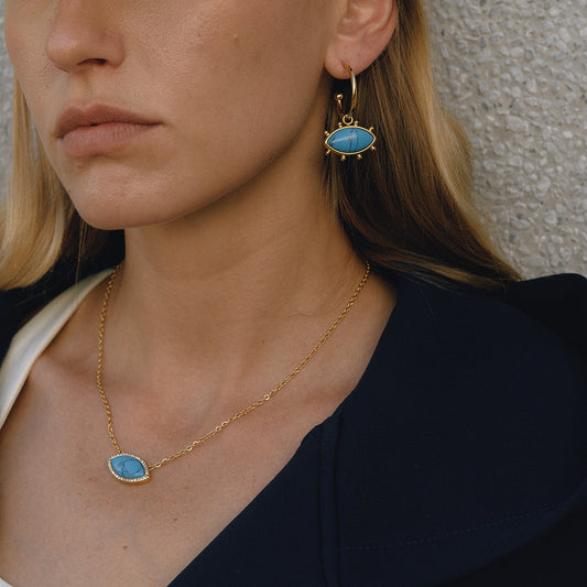 Collana con Ciondolo Occhio di Demone e Orecchini Turchesi in Acciaio al Titanio con Finitura Placcata da Donna