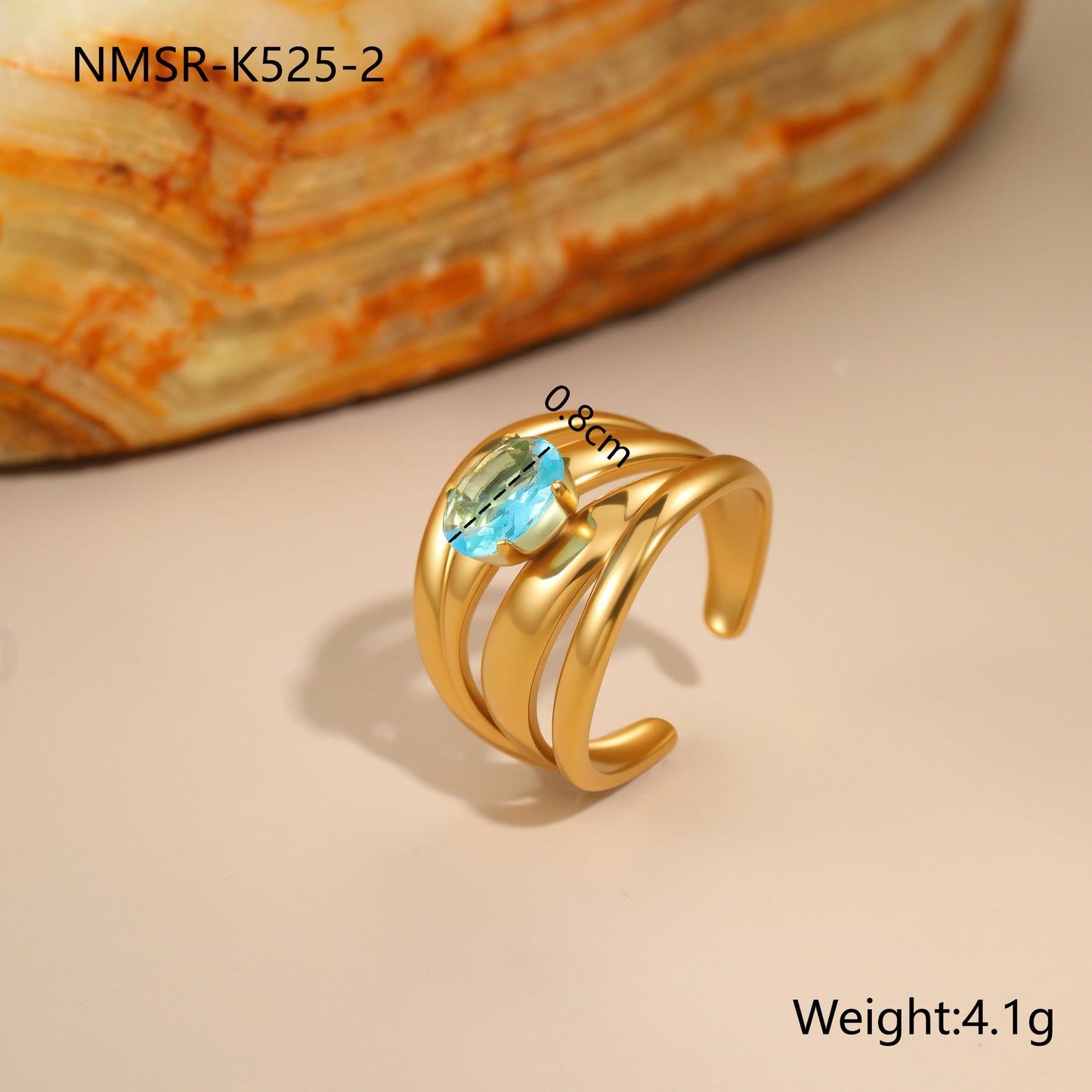 Anillo minimalista de acero inoxidable hueco geométrico con incrustaciones de circonita azul y baño de oro de 18 quilates para mujer