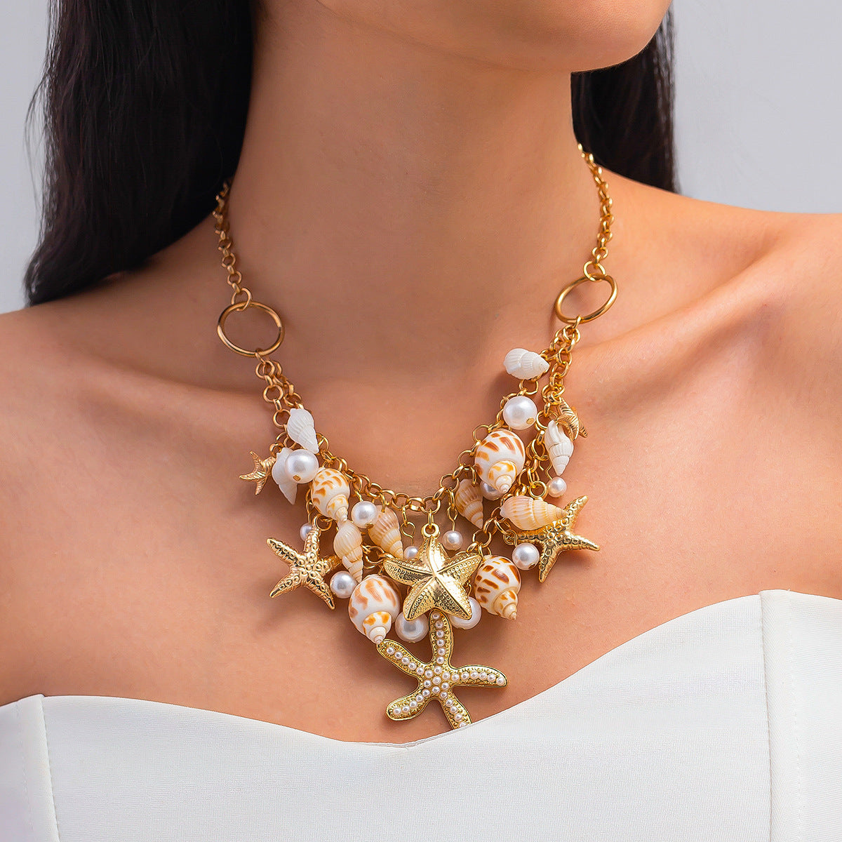 Collana con ciondolo a stella e conchiglia in stile vacanza con dettaglio nappa in lega con finitura placcata per donne e uomini