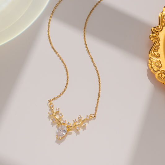 Collar con colgante de cuerno de ciervo minimalista estilo natural para mujer, cadena de onda de agua de acero de titanio con chapado en oro