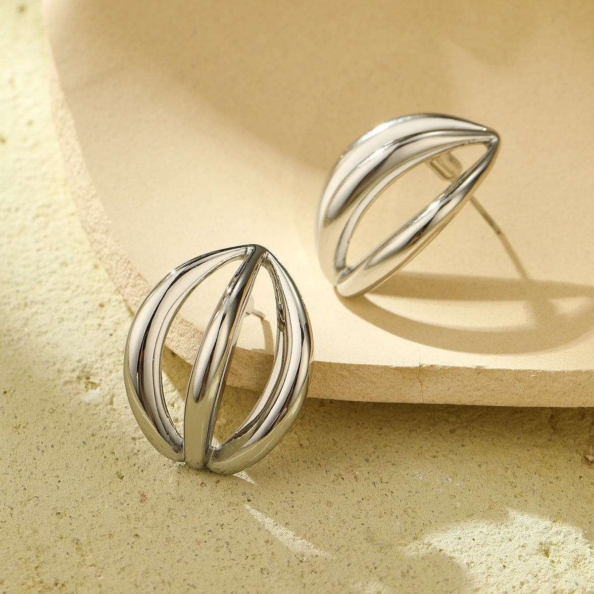 Vintage-Style Irregular Hollow-Out Titanium Steel Earrings for Women with 18K Gold Plating