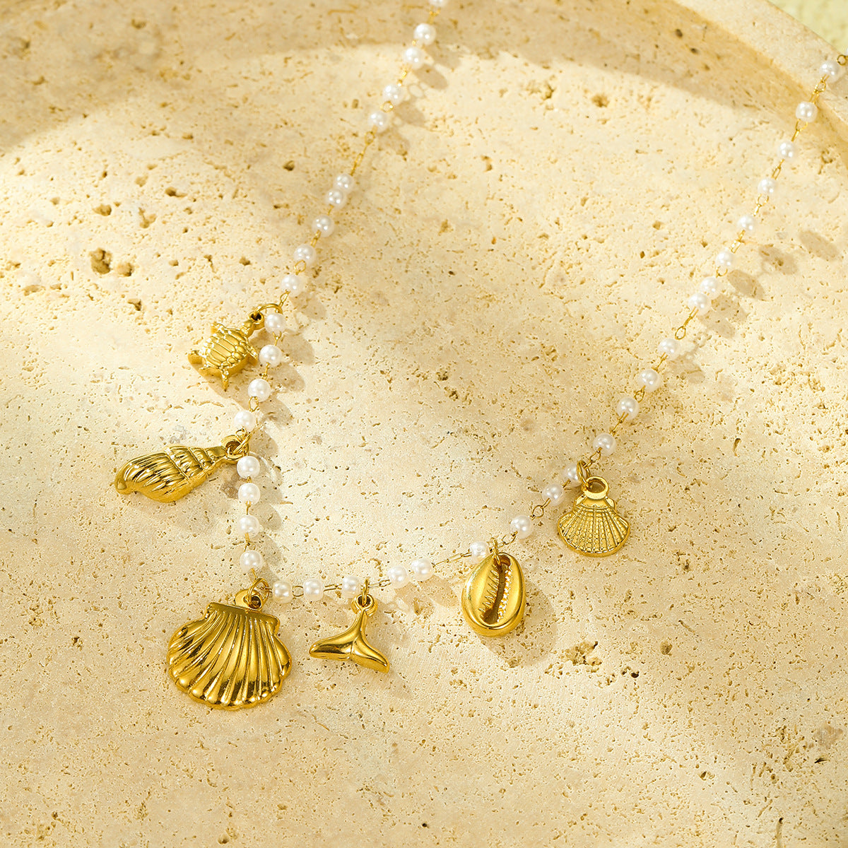 Ocean-Themed Pearl-Embellished Titanium Steel Pendant Necklace with Starfish and Seashell Motifs, Fashionable Minimalist Design for Women