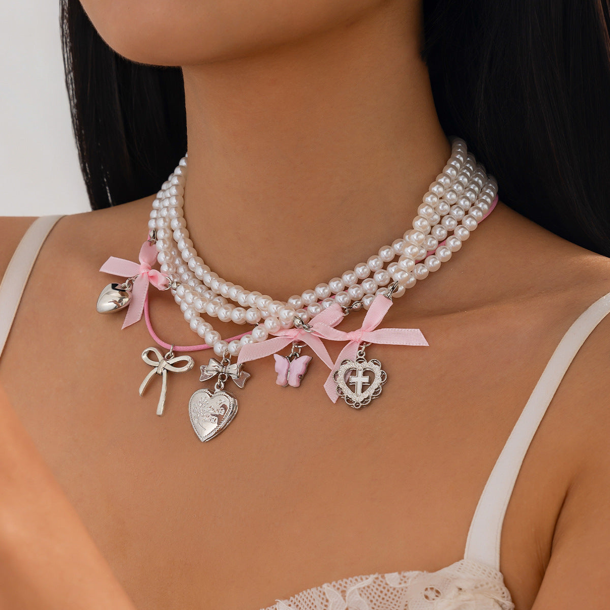 Sweet Minimalist Heart and Bow Knot Pendant Necklace for Women with Imitation Pearl Accents on Beaded Chain
