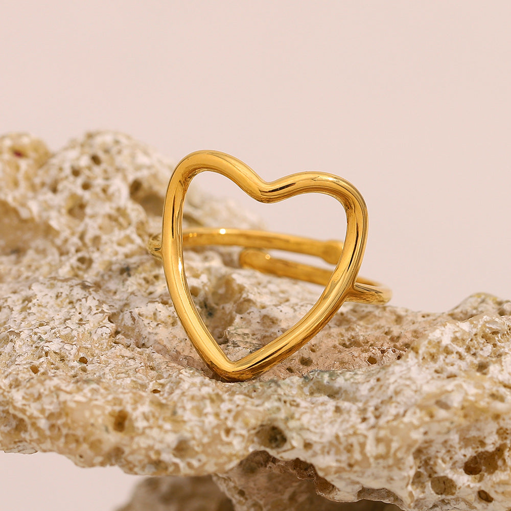 Anello in acciaio inossidabile a forma di cuore minimalista con placcatura in oro 18 carati, design a fascia aperta cava da donna