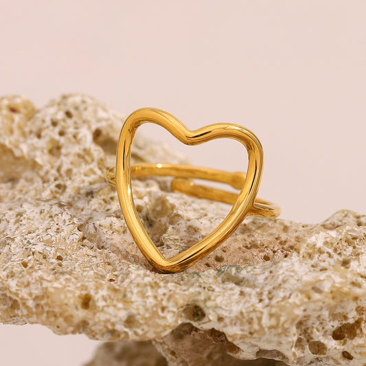 Anello in acciaio inossidabile a forma di cuore minimalista con placcatura in oro 18 carati, design a fascia aperta cava da donna