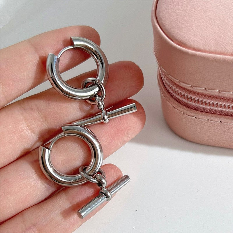 Orecchini pendenti da donna vintage geometrici a T in acciaio al titanio placcato oro 18 carati