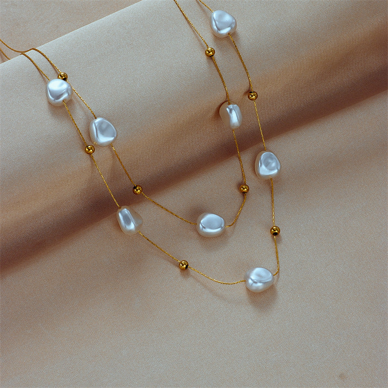 Collana Pendente Asimmetrica Geometria Stile Barocco Vintage in Acciaio al Titanio con Intarsio in Madreperla e Placcatura Oro