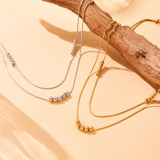 Set di collana e bracciale a sfera con perline e catena a serpente minimalista in acciaio inossidabile