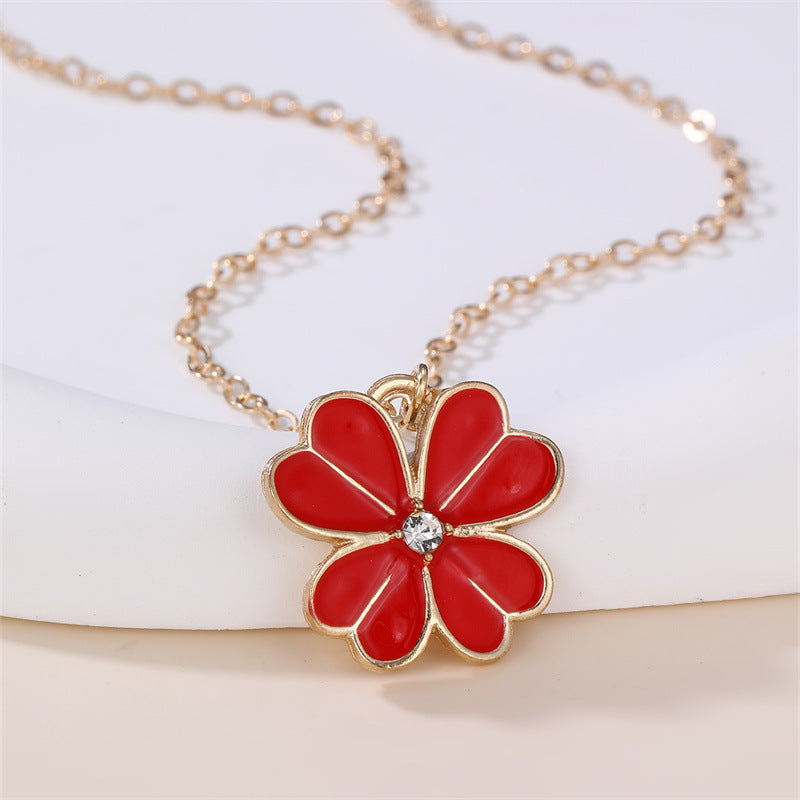 Collar con colgante esmaltado con forma de lazo floral dulce para niñas con dije de aleación y detalles de pedrería