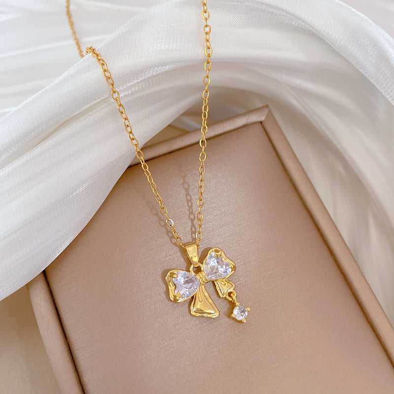 Collar de lujo de acero de titanio con colgante de mariposa y lazo de diamantes de imitación para mujer con cadena ajustable de 21 a 50 cm