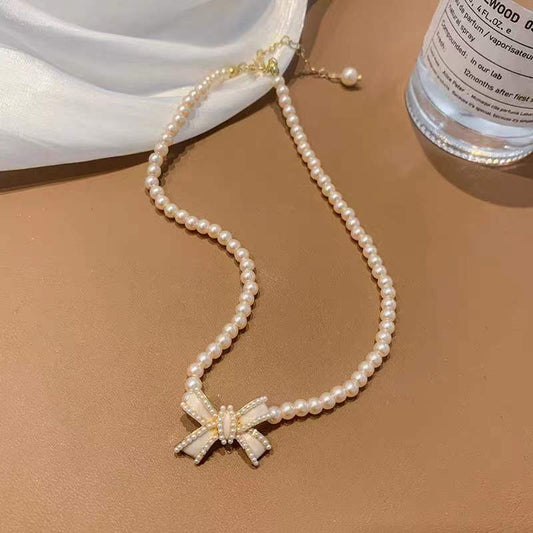 Collar Vintage con Lazo y Perlas para Mujer, con Colgante de Aleación y Cadena Adornada con Perlas, Estilo Dulce y Fresco